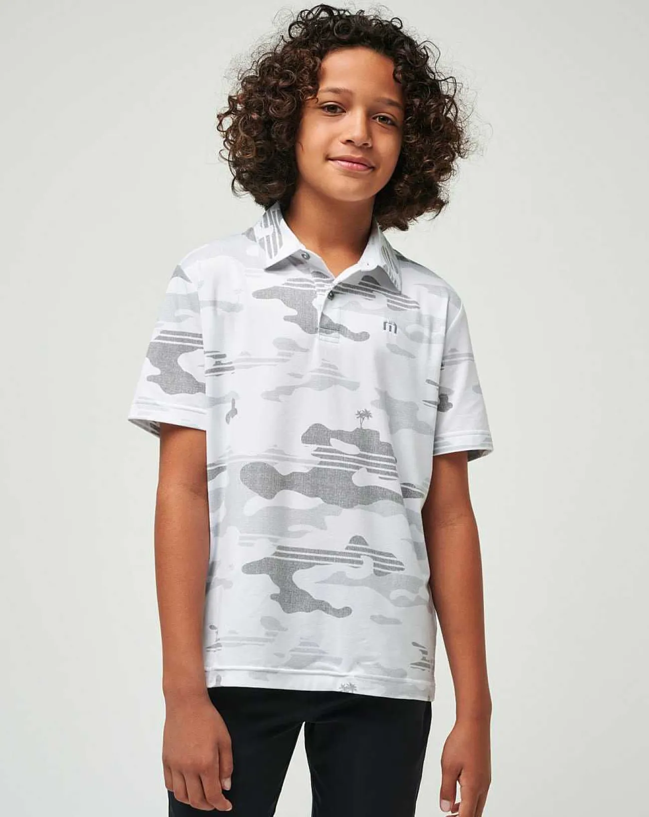 TravisMathew Youth Tops>Heater Camo Youth Polo