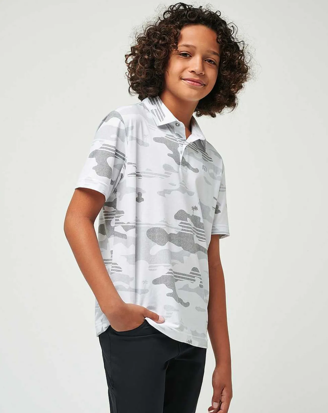 TravisMathew Youth Tops>Heater Camo Youth Polo