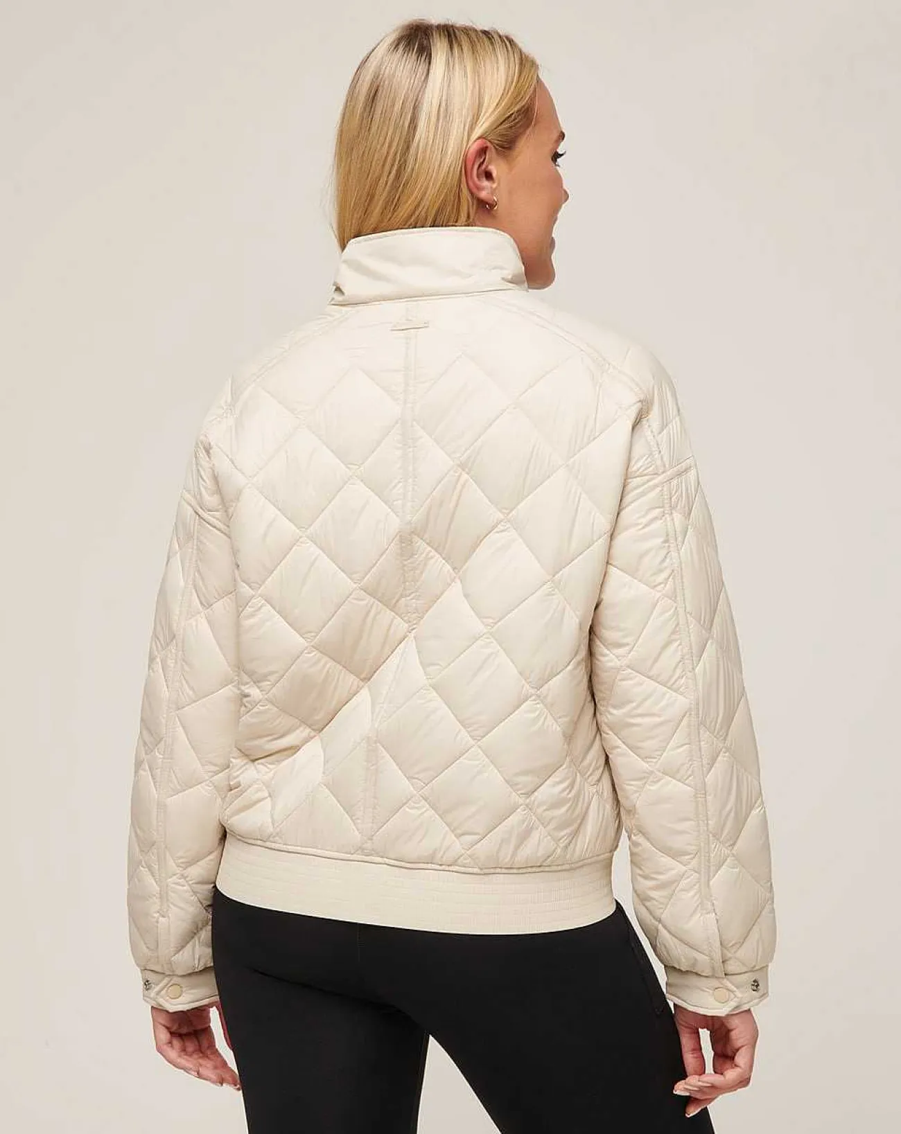 TravisMathew Jackets>Lights At Night Quilted Jacket