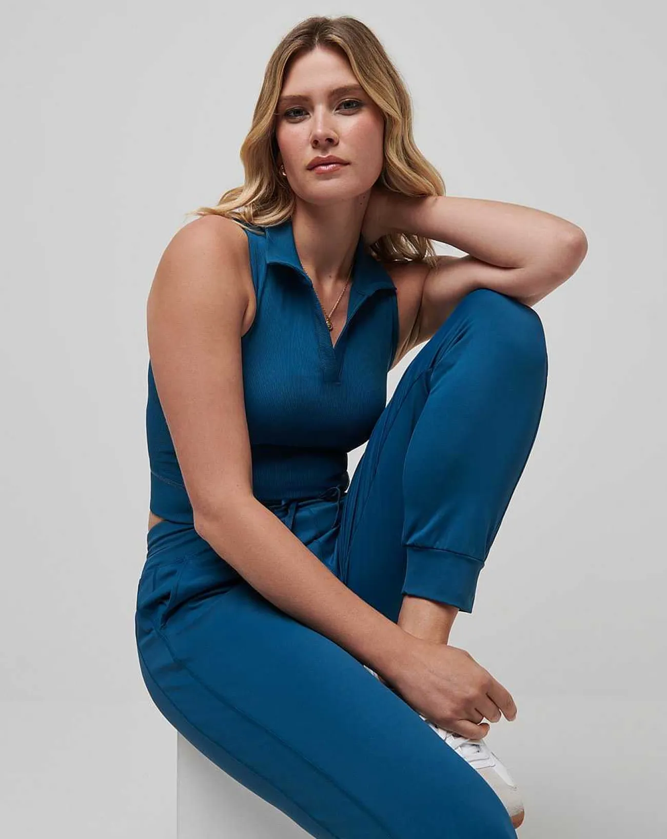TravisMathew Polos>Moveknit Sleeveless Vneck Polo