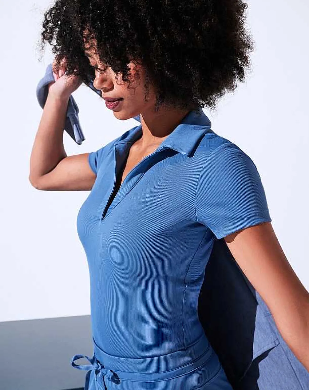 TravisMathew Polos>Moveknit Vneck Polo