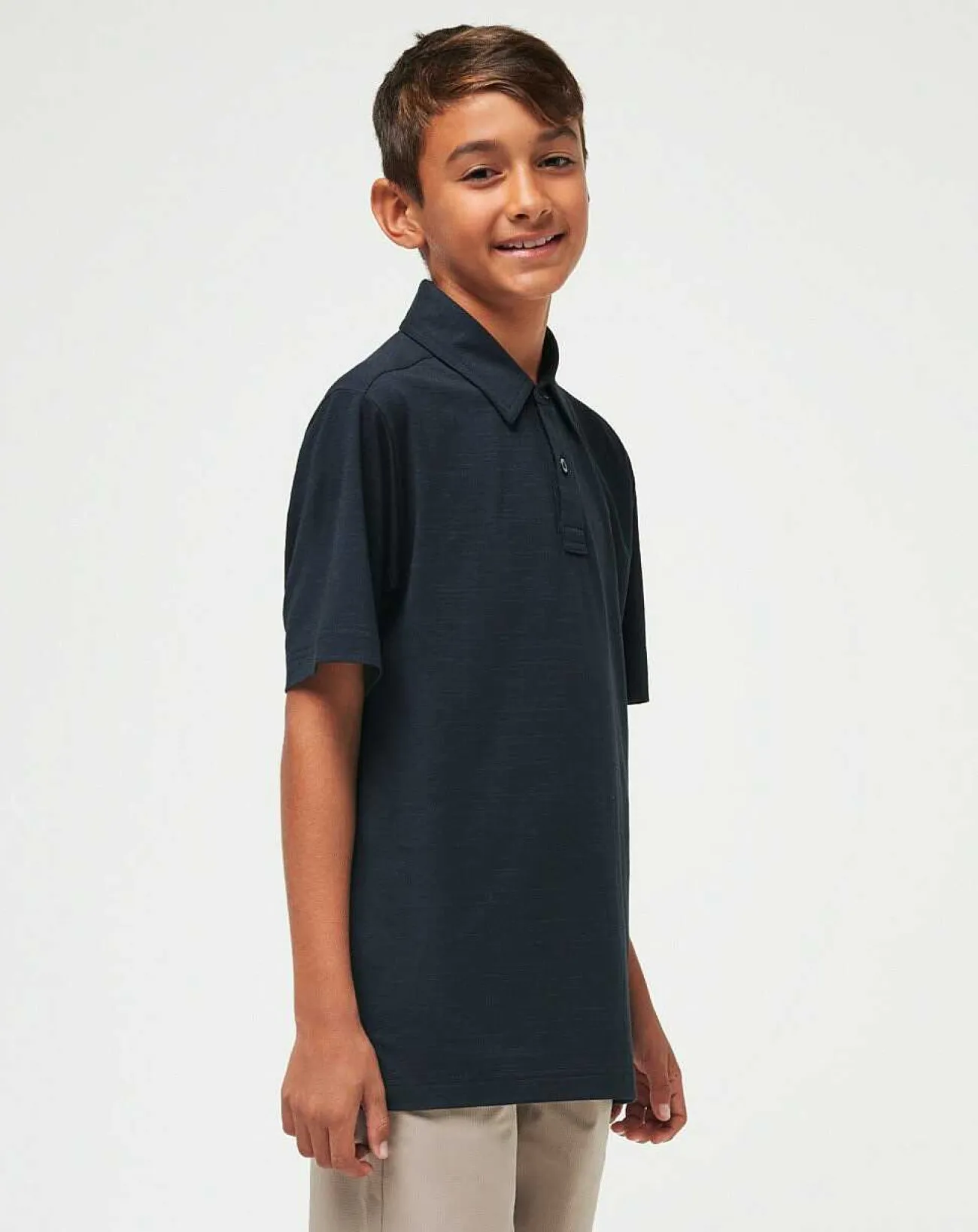 TravisMathew Youth Tops>The Heater Youth Polo