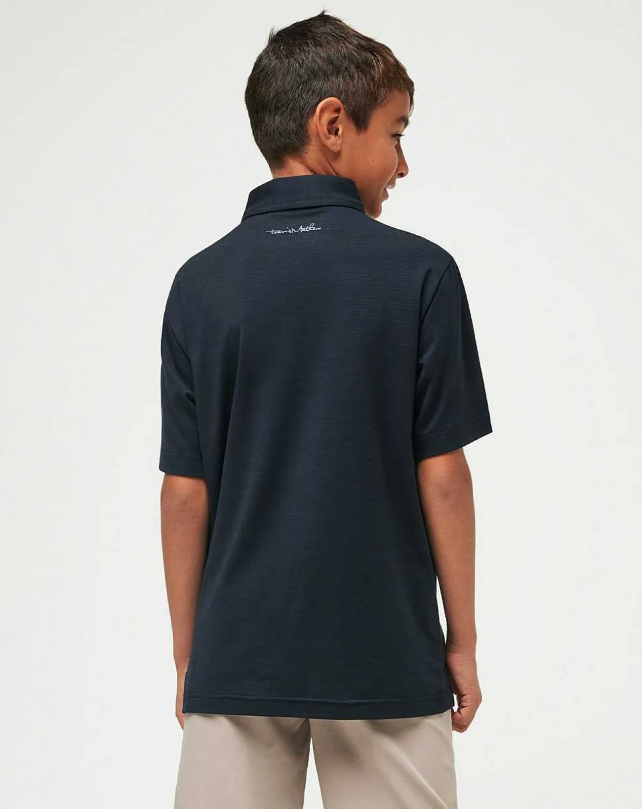 TravisMathew Youth Tops>The Heater Youth Polo