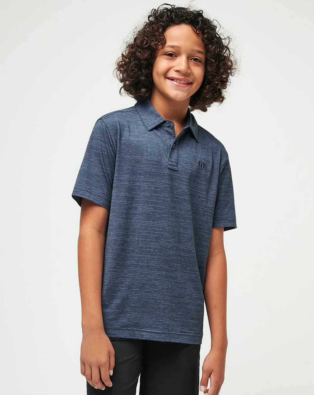 TravisMathew Youth Tops>The Heater Youth Polo
